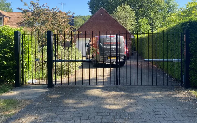 Swing gates with back motors by Gatehouse Security, Haywards Heath, West Sussex